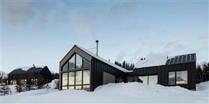 Chalet de La Malbaie : une composition à la fois rustique et raffinée